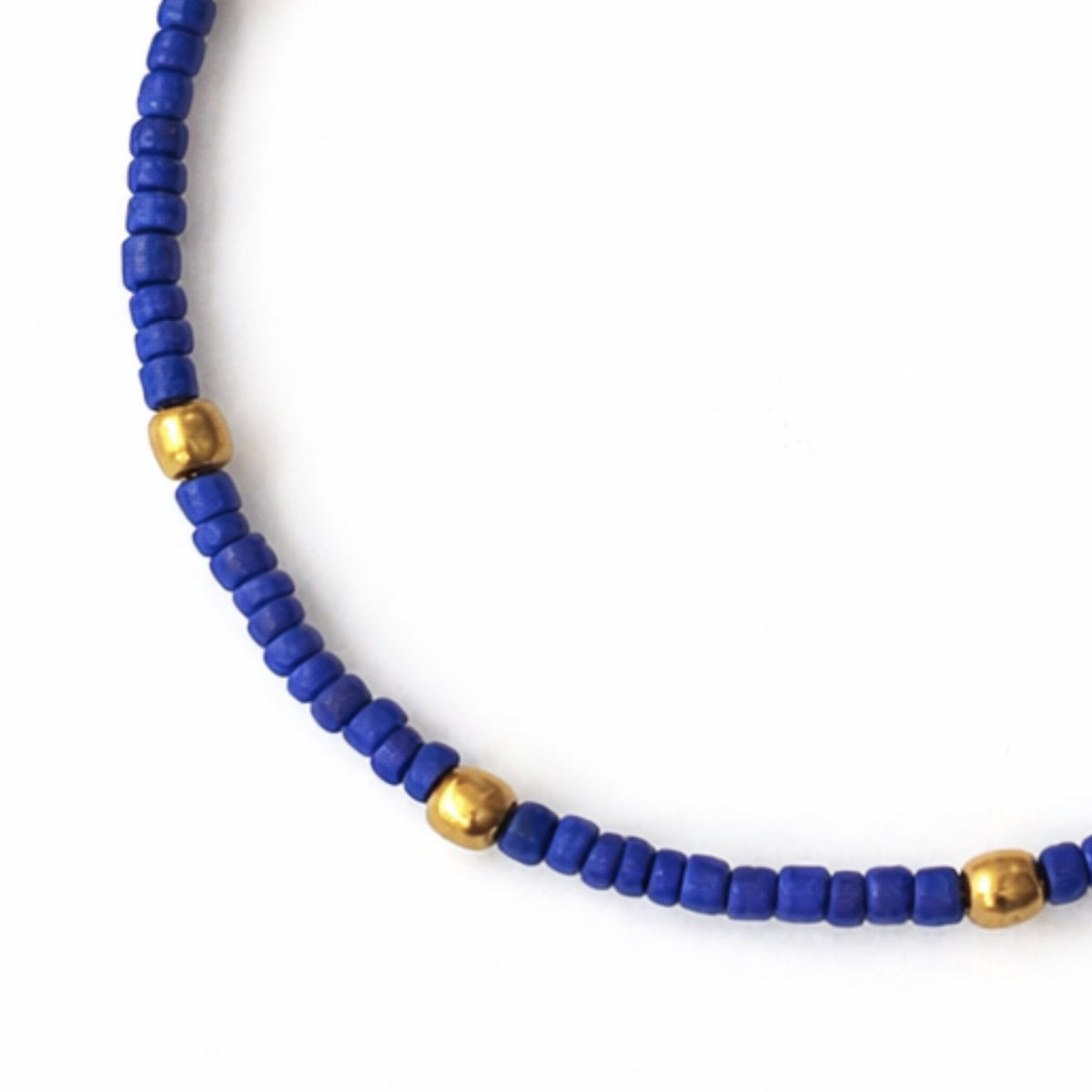 Slim anklet with lapis lazuli and brass beads from Nepal - (22 cm)